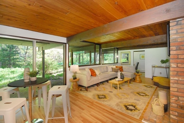 201 Annursnac Hill Rd, Concord, MA 01742 - sunroom / solarium with wood finished floors, beam ceiling, wood ceiling, and an outdoor living space
