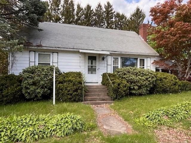 7 Heather Ave, Millbury, MA 01527 - view of front of home with a chimney