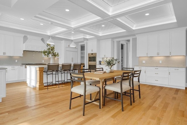 dining space with light wood-style flooring, recessed lighting, coffered ceiling, ornamental molding, and beam ceiling