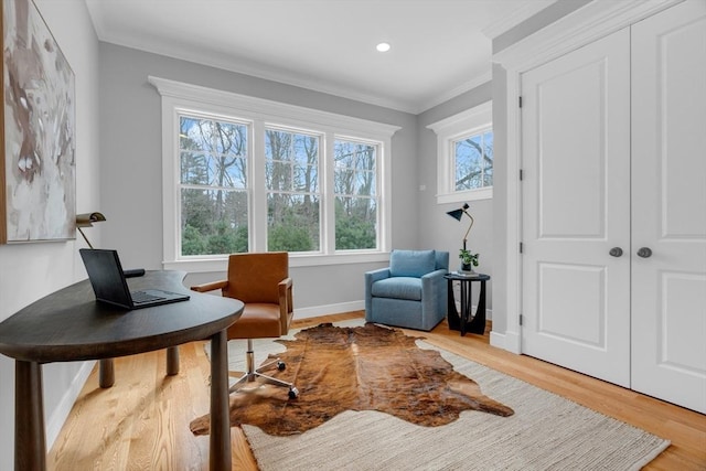 office space featuring recessed lighting, baseboards, crown molding, and wood finished floors