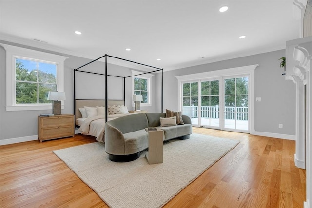 bedroom featuring access to outside, ornamental molding, light wood-style flooring, and baseboards