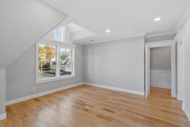 bonus room featuring lofted ceiling, light wood finished floors, baseboards, and recessed lighting