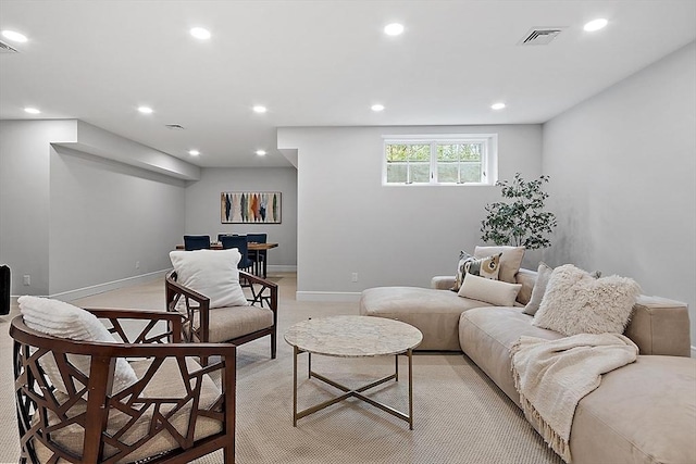 living room featuring visible vents, baseboards, and recessed lighting