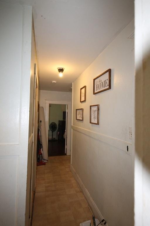 hall featuring light floors