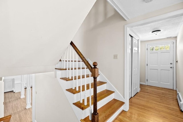 foyer entrance featuring light hardwood / wood-style flooring