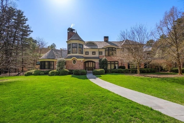 view of front of home with a front yard