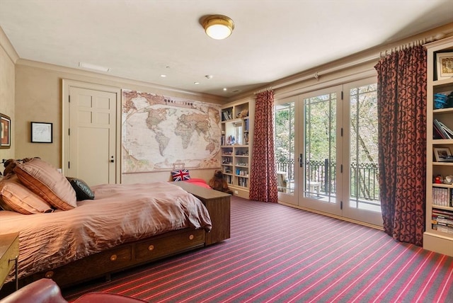 bedroom featuring crown molding, carpet flooring, and access to exterior