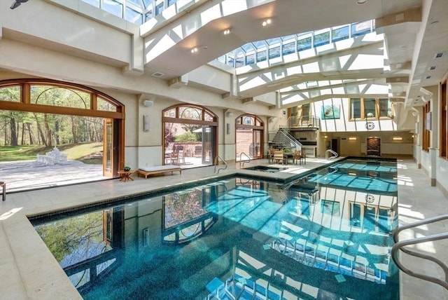 view of pool featuring a skylight