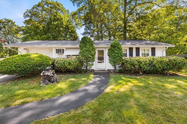 33 Clara Rd, Brockton, MA 02302 - single story home featuring a garage, a front yard, and a chimney