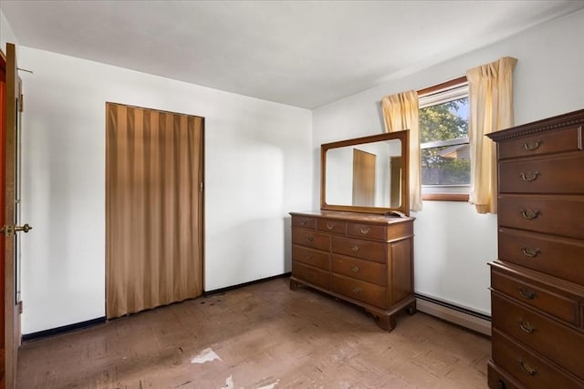 33 Clara Rd, Brockton, MA 02302 - bedroom featuring a baseboard radiator and light wood-style flooring