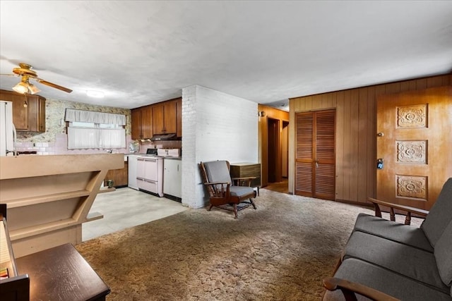 33 Clara Rd, Brockton, MA 02302 - living area featuring ceiling fan and wooden walls