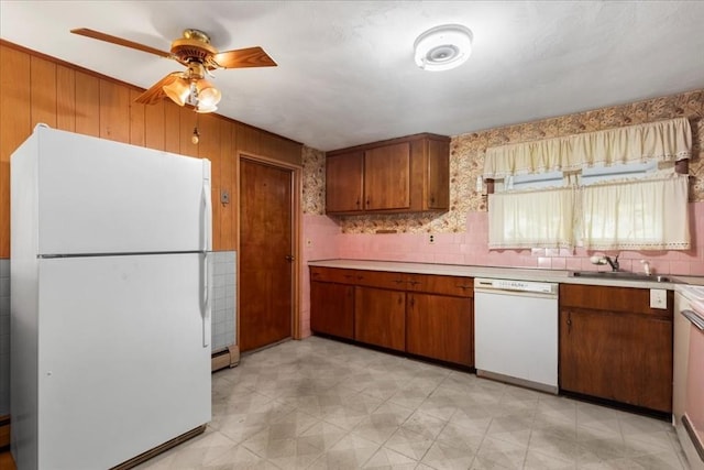 33 Clara Rd, Brockton, MA 02302 - kitchen featuring white appliances, brown cabinetry, light countertops, a ceiling fan, and light floors