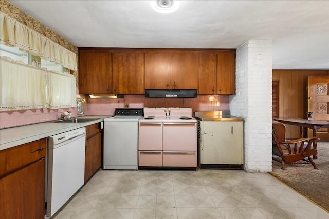 33 Clara Rd, Brockton, MA 02302 - kitchen featuring white appliances, under cabinet range hood, washer / clothes dryer, light flooring, and brown cabinetry