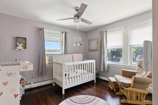 33 Argyle Rd Unit 33, Braintree, MA 02184 - bedroom featuring baseboard heating, a nursery area, and wood-type flooring