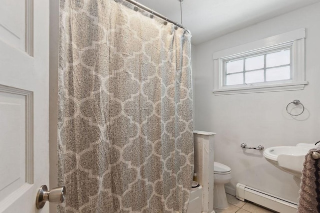 33 Argyle Rd Unit 33, Braintree, MA 02184 - bathroom with a baseboard heating unit and tile patterned floors