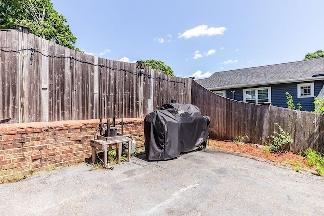33 Argyle Rd Unit 33, Braintree, MA 02184 - fenced backyard with a patio and grilling area