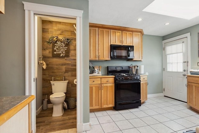 33 Argyle Rd Unit 33, Braintree, MA 02184 - kitchen featuring black appliances, recessed lighting, a skylight, and light tile patterned floors