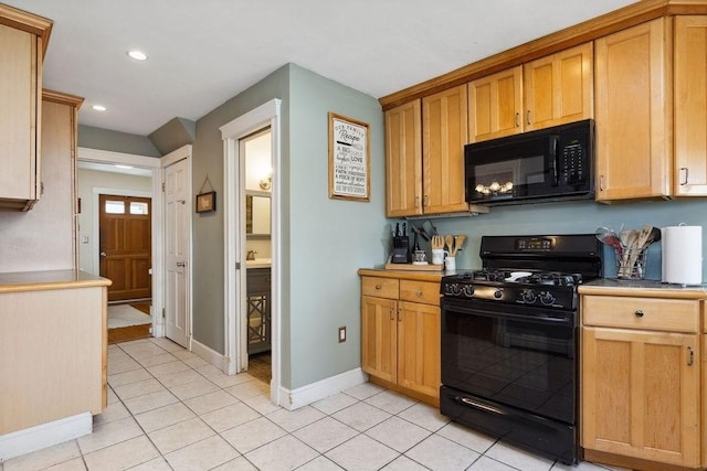 33 Argyle Rd Unit 33, Braintree, MA 02184 - kitchen featuring black appliances, light tile patterned flooring, recessed lighting, and light countertops