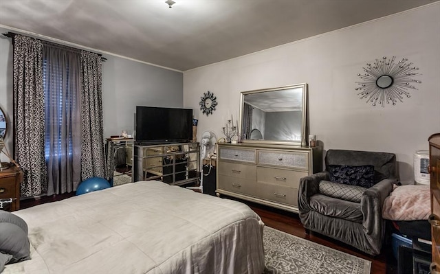 bedroom featuring dark hardwood / wood-style floors