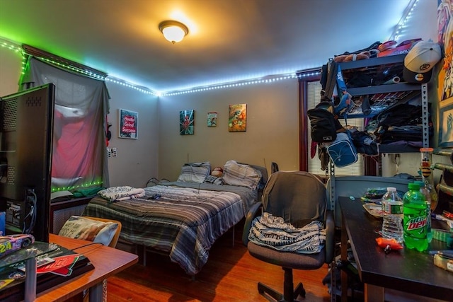 bedroom featuring wood-type flooring