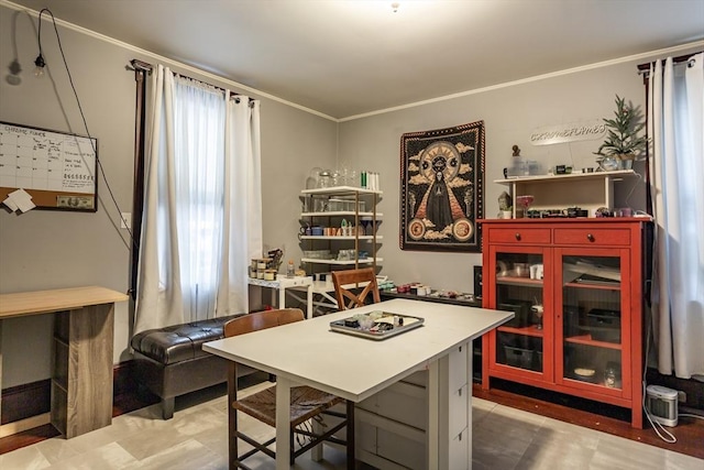 home office with crown molding and a wealth of natural light