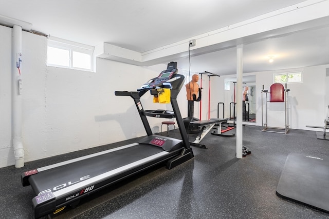 workout area with baseboard heating