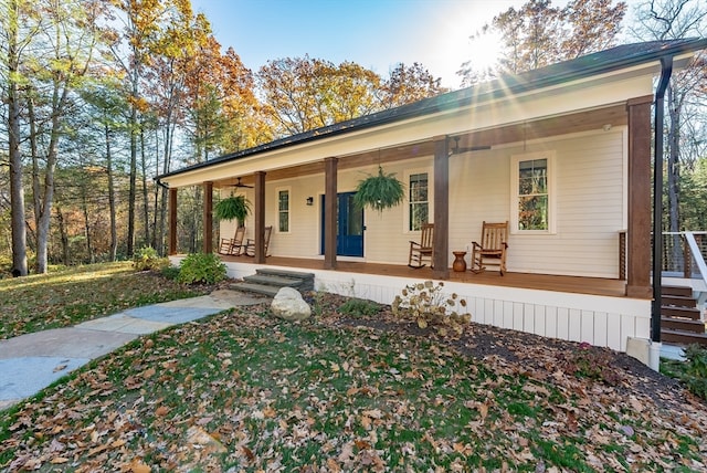 ranch-style house with covered porch