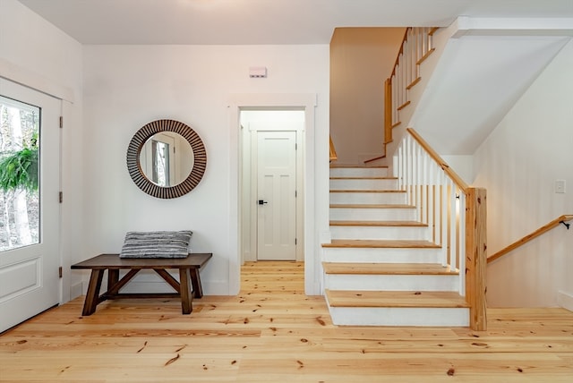 entrance foyer with hardwood / wood-style floors