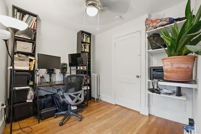 5 Ellington Rd, Quincy, MA 02171 - office area featuring wood finished floors, a ceiling fan, and radiator heating unit