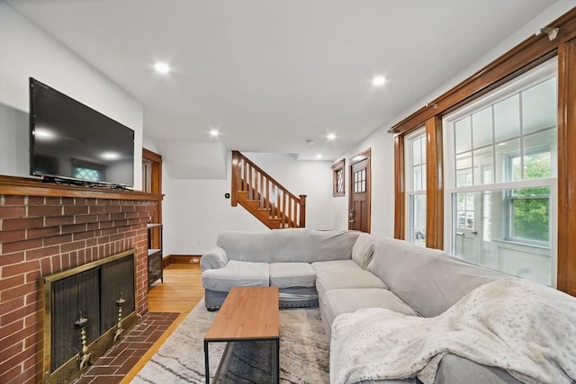 5 Ellington Rd, Quincy, MA 02171 - living area featuring wood finished floors, stairs, baseboards, recessed lighting, and a fireplace