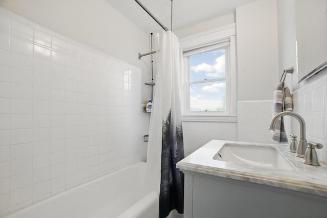 5 Ellington Rd, Quincy, MA 02171 - bathroom with shower / bathtub combination with curtain, vanity, and tile walls