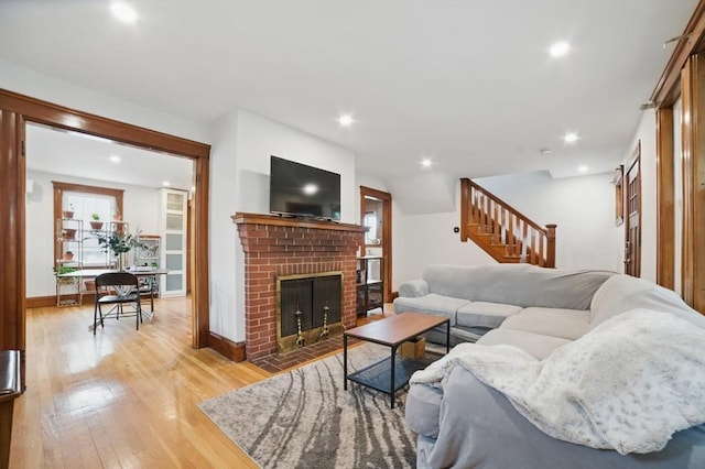 5 Ellington Rd, Quincy, MA 02171 - living area with stairs, light wood-style flooring, a fireplace, recessed lighting, and baseboards