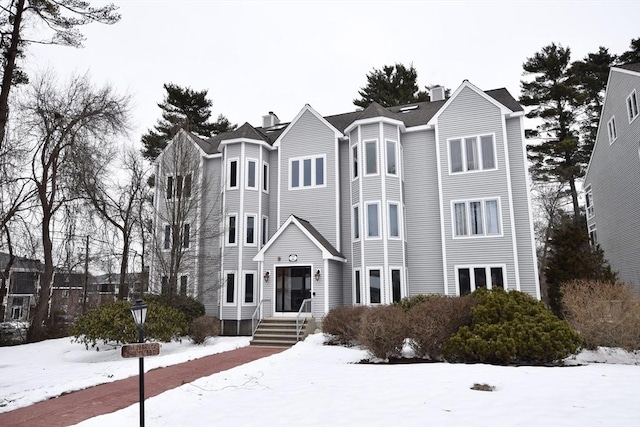 view of front of house with a chimney