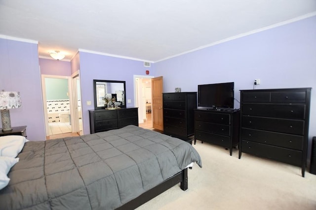 carpeted bedroom featuring connected bathroom, visible vents, and crown molding