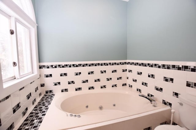 bathroom featuring a jetted tub