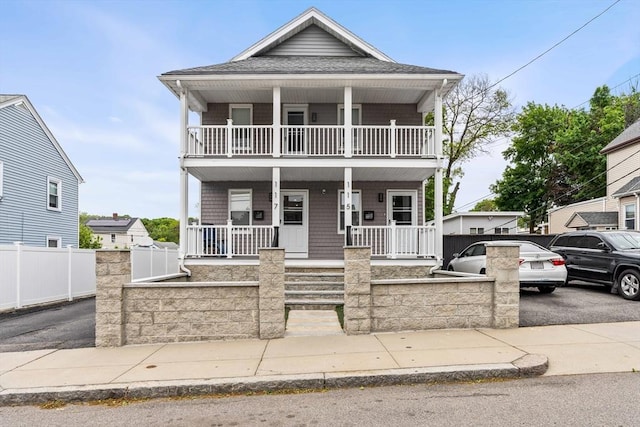 115-117 Clare Ave, Boston, MA 02136 - townhome / multi-family property with a porch, roof with shingles, a balcony, and driveway