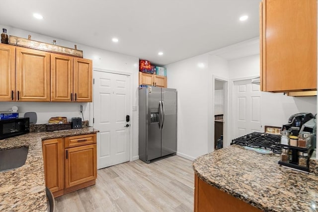 115-117 Clare Ave, Boston, MA 02136 - kitchen featuring stainless steel fridge, light wood finished floors, stone counters, black microwave, and recessed lighting