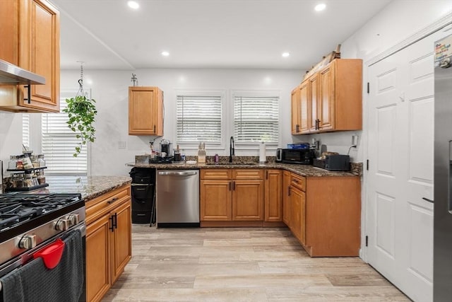 115-117 Clare Ave, Boston, MA 02136 - kitchen featuring stainless steel appliances, a sink, light wood-style floors, dark stone counters, and recessed lighting