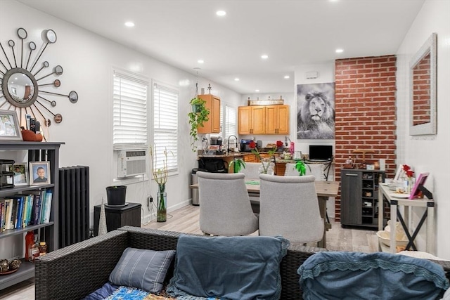 115-117 Clare Ave, Boston, MA 02136 - living room featuring light wood finished floors, radiator heating unit, recessed lighting, and cooling unit