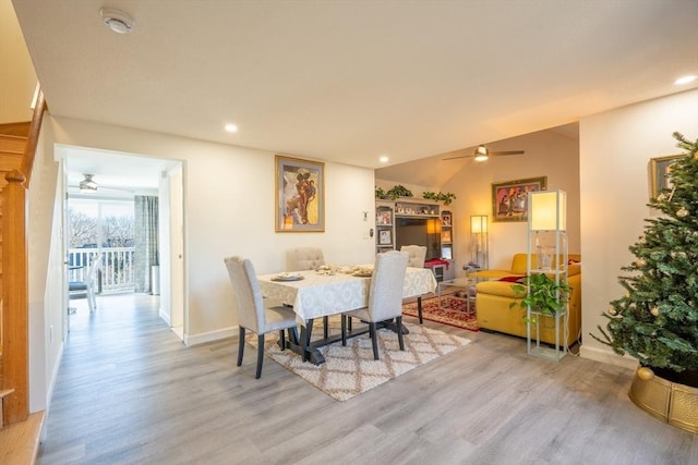 dining space with light wood-type flooring, ceiling fan, baseboards, and recessed lighting