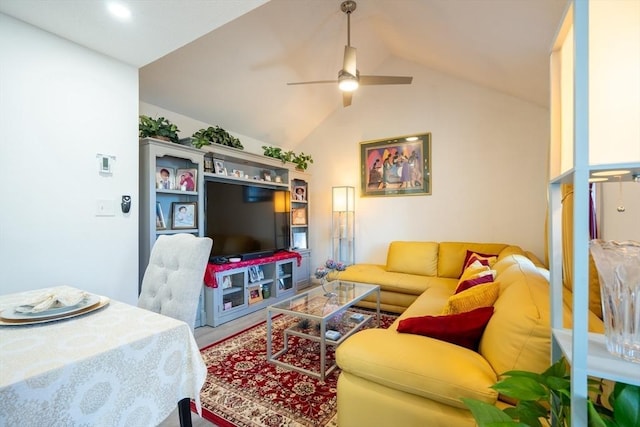 living room featuring lofted ceiling and ceiling fan