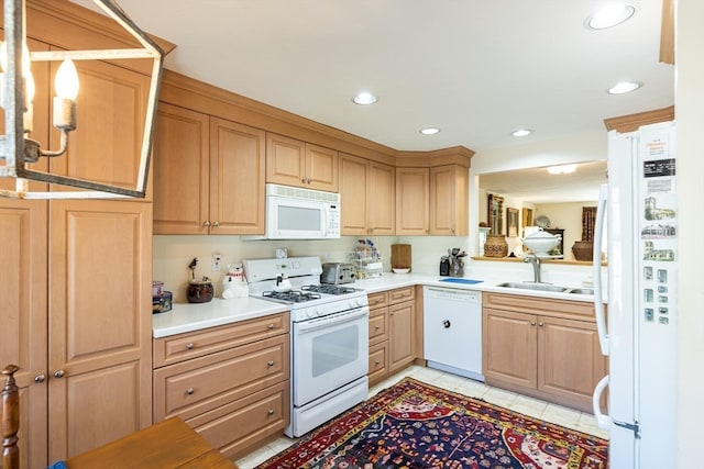 kitchen with white appliances, light tile patterned floors, and sink