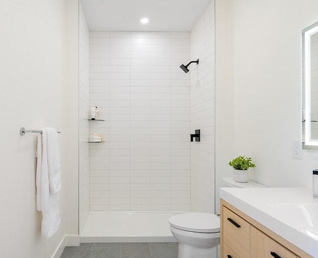 full bathroom featuring toilet, recessed lighting, vanity, tile patterned floors, and a stall shower