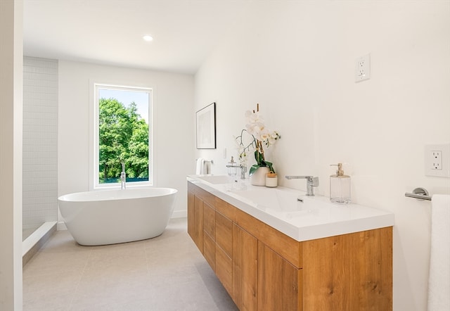 bathroom featuring tile flooring and vanity