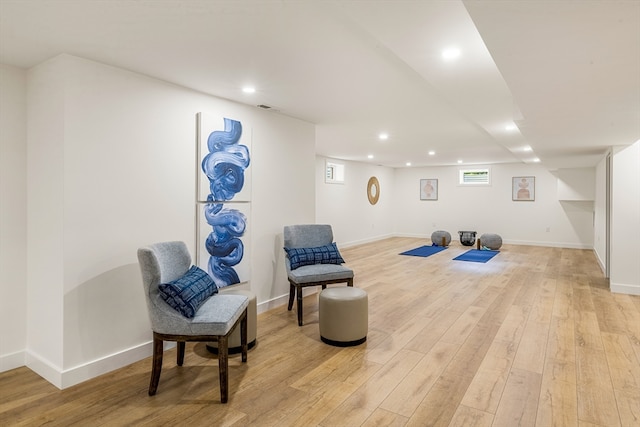 sitting room with light hardwood / wood-style flooring