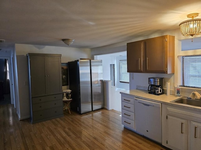 68 Lake Shore Dr, West Brookfield, MA 01585 - kitchen with freestanding refrigerator, dishwasher, light countertops, dark wood-style floors, and a chandelier
