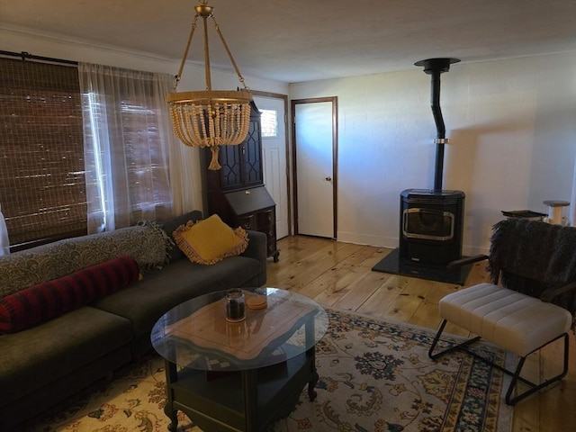 68 Lake Shore Dr, West Brookfield, MA 01585 - living area featuring light wood finished floors and a wood stove