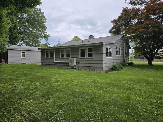 68 Lake Shore Dr, West Brookfield, MA 01585 - rear view of property featuring a chimney and a yard