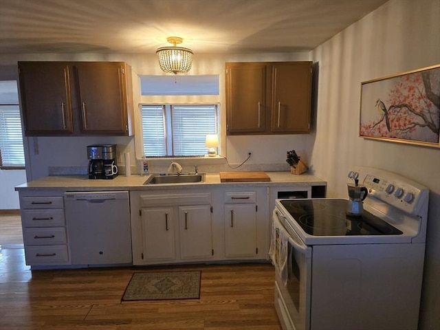 68 Lake Shore Dr, West Brookfield, MA 01585 - kitchen with dishwasher, white range with electric cooktop, light countertops, and dark wood-style flooring