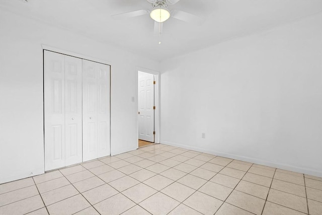 6 Arizona Ter Unit 2, Arlington, MA 02474 - unfurnished bedroom with a closet, ceiling fan, and light tile patterned floors